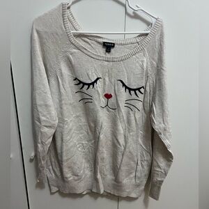 Cat face sweater.